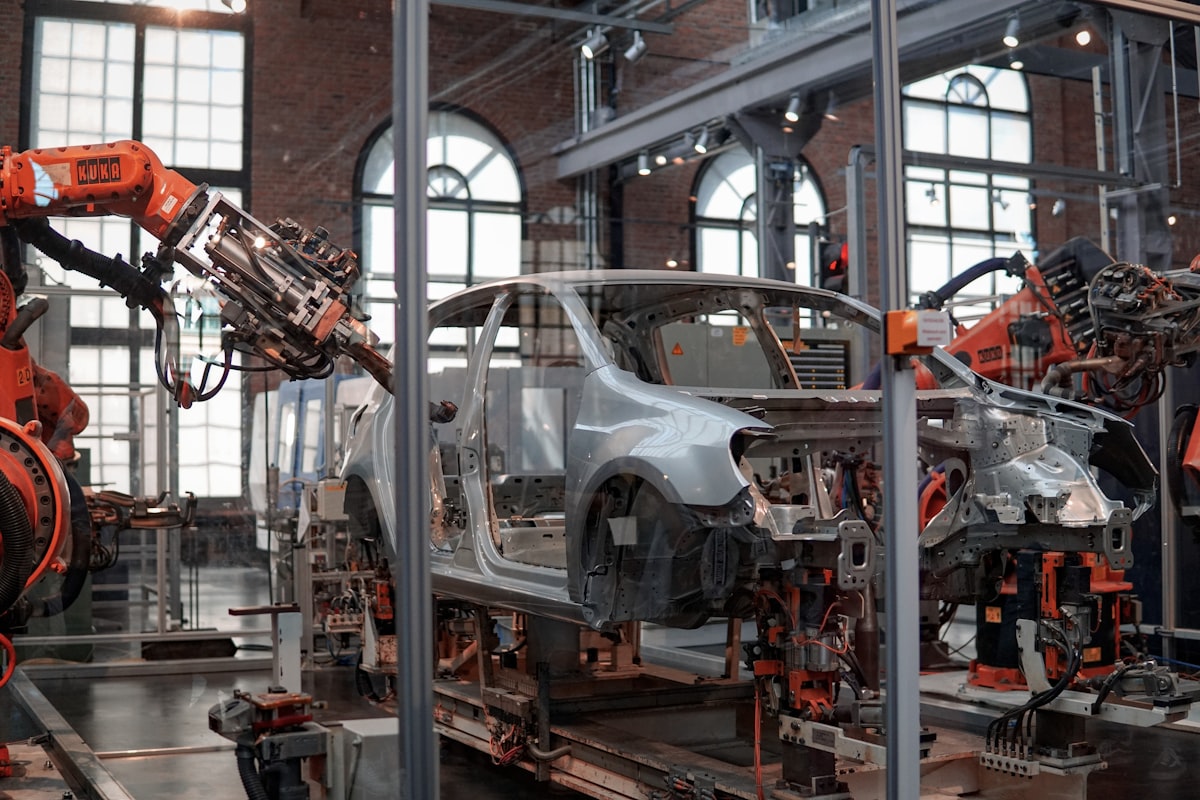 Car body on an automotive manufacturing line with industrial robots